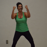 Instructor Marie shows her students how to perform certain Jazzercise moves.