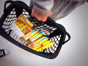 Stocking up on Pizza Rolls at Vons.